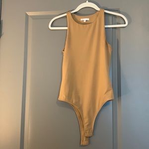 Woman’s nude bodysuit
